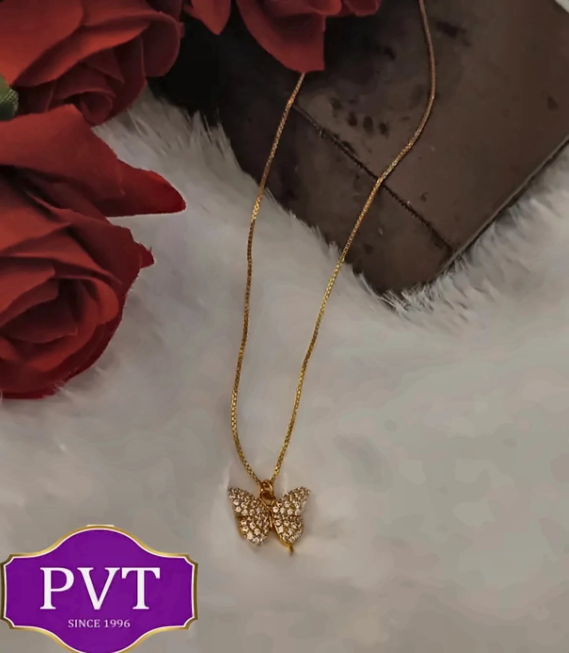 Delicate gold chain with a sparkling butterfly pendant